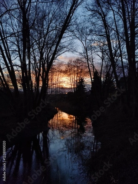 Fototapeta Sunset of a river