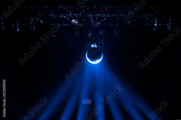 Obraz the mirror ball with dark blue color light in haze