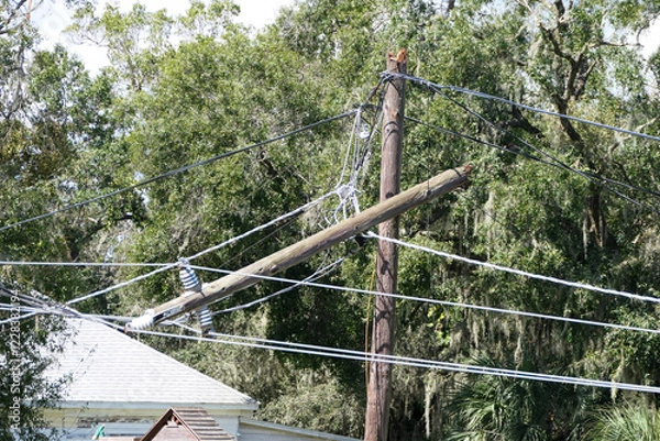 Obraz broken telephone pole after hurricane damage