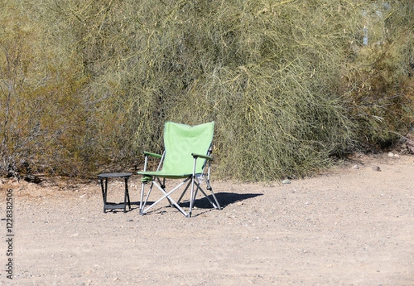 Obraz Camping Chair and Table sitting alone in the desert sand