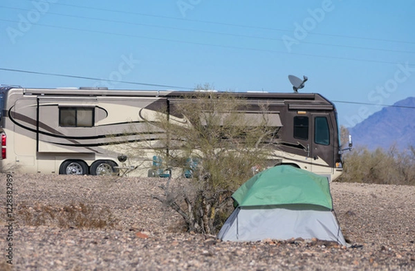 Obraz Camping difference between a tent and an A-class RV