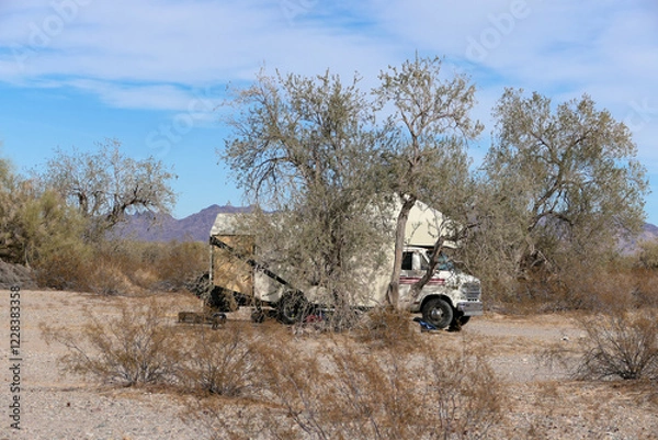 Obraz Stealth Camper Camping in the Desert Brush