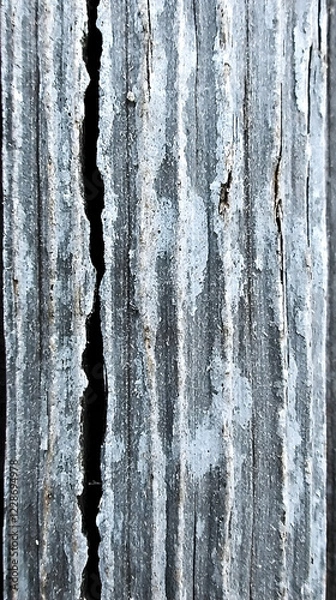 Fototapeta Weathered vertical wooden planks, cracked texture, grunge background,  industrial setting, design element