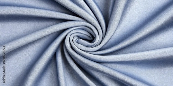 Fototapeta A close-up of soft, light blue fabric, intricately twisted to showcase texture and sheen.