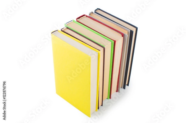 Fototapeta stack of multicolored books. on white, isolated background.
