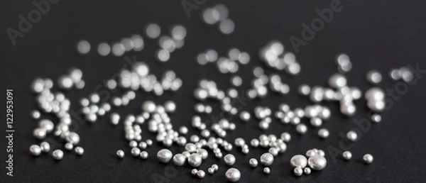 Obraz Pure silver granules on a dark background