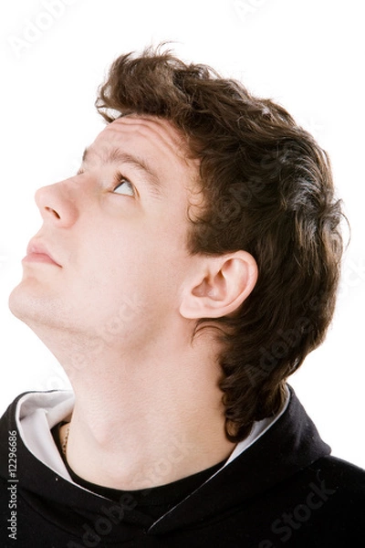 Fototapeta Close-up portrait of man looking into the upper left corner