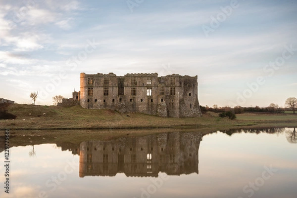 Obraz Carew Castle  at sunrise, with reflections