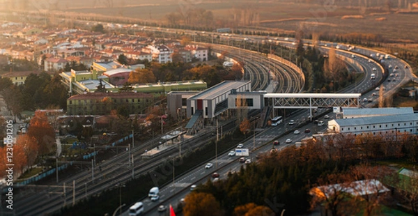 Fototapeta Miniature image of train stop and traffic at sunset  ANKARA from a hundred meters above / Merkez Ankara Houses