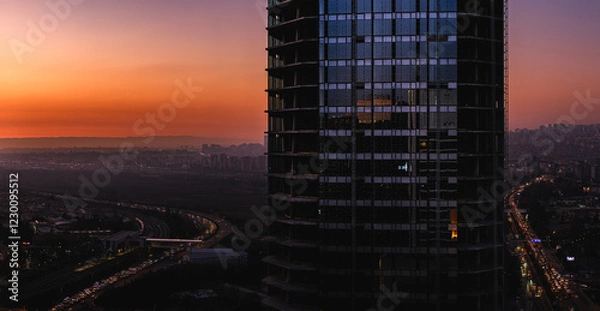 Fototapeta City sunset falling on both sides of a skyscraper / ANKARA from a hundred meters above / Merkez Ankara Houses