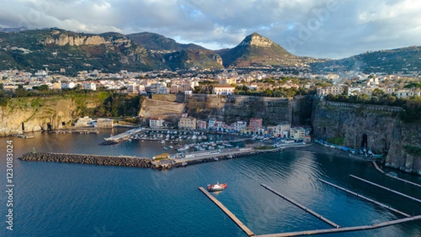 Fototapeta Sorrento Coast. Aerial photo of the Marina di Cassano port in Piano di Sorrento. Characteristic landscape of the city on the cliff overlooking the sea