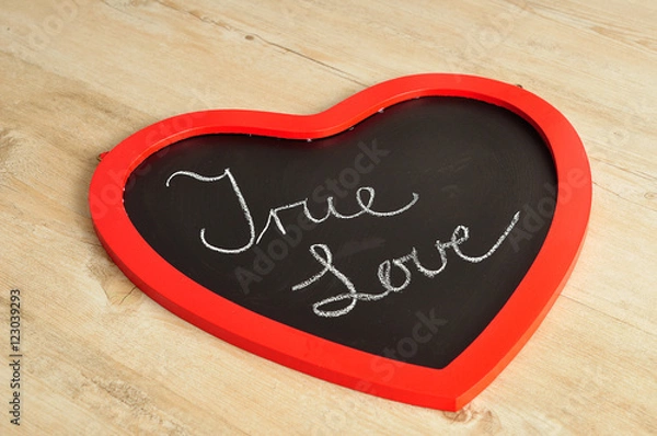Obraz Valentine's Day. A heart shape black board with true love