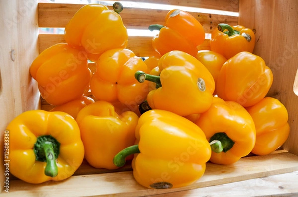 Obraz Wood crate with yellow bell peppers