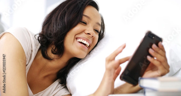 Fototapeta Happy, browsing and woman with smartphone, laughing and funny videos on social media, relax and online. House, scroll and entertainment for African person with app, digital and comfortable in weekend