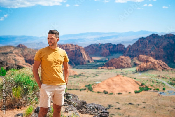 Fototapeta Young hiker man on his way in National Park in Utah. Man with in Zion national park