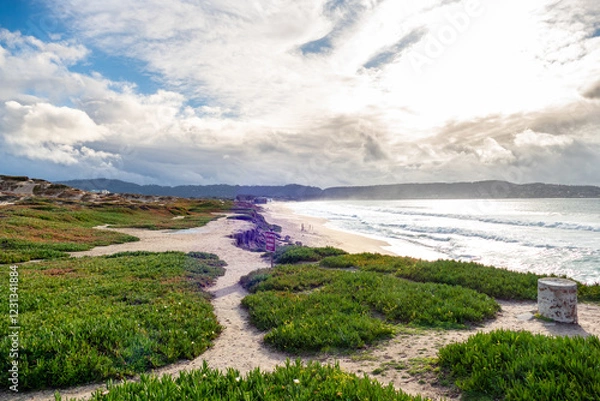 Fototapeta Sunset at the beach of Fort Ord Dunes State Park close to Monterey, California