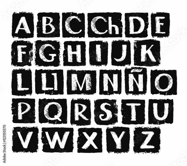 Fototapeta Spanish alphabet, in capital white letters on a black background. Vector, white letters on black rectangles. The texture of chalk on the black soot, simulation.  