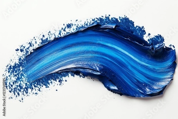 Fototapeta Swirls of vibrant blue paint create an artistic wave on a crisp white background during a creative studio session