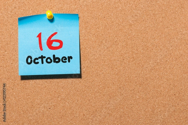 Fototapeta October 16th. Day 16 of month, color sticker calendar on notice board. Autumn time. Empty space for text