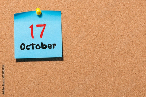 Fototapeta October 17th. Day 17 of month, color sticker calendar on notice board. Autumn time. Empty space for text