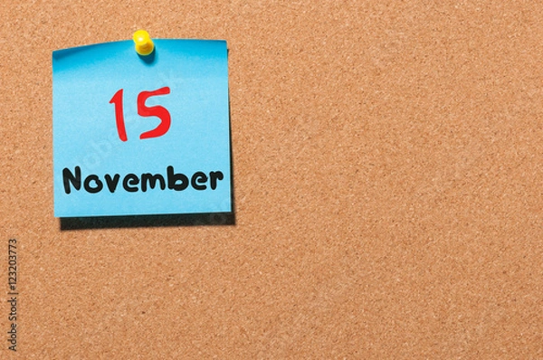 Fototapeta November 15th. Day 15 of month, color sticker calendar on notice board. Autumn time. Empty space for text
