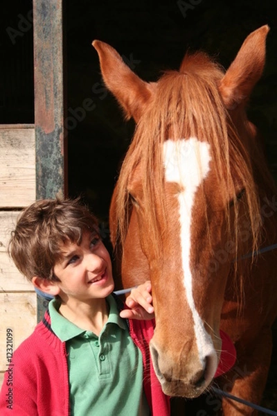Obraz niño con caballo