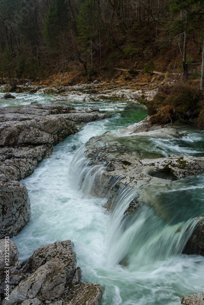 Obraz A cascade waterfall in the forrest river