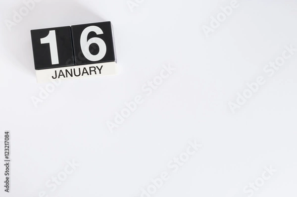 Fototapeta January 16th. Day 16 of month, calendar on white workplace background. Winter time. Empty space for text