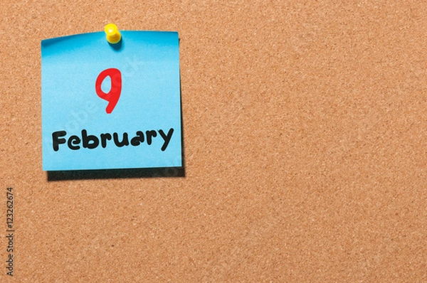 Fototapeta February 9th. Day 9 of month, calendar on cork notice board background. Winter concept. Empty space for text