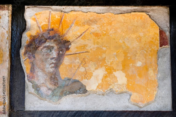Fototapeta fresco of the deity of the God Apollo or Sol with the cosmic crown and a whip, in the Tavern of the Four Deities in Pompeii, Naples, Campania, Italy, buried by Vesuvius