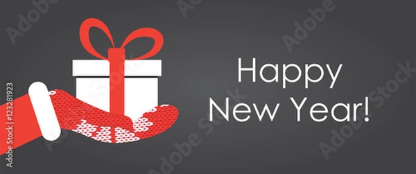 Obraz Gift box in Santa's hand