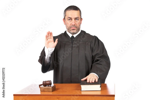 Obraz Serious male judge taking oath