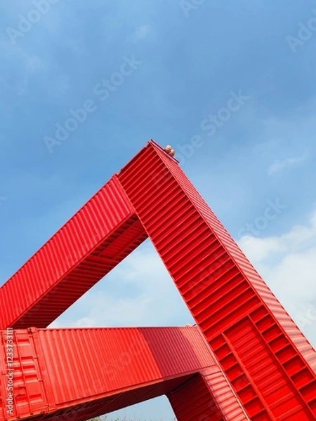 Obraz Red cargo container on blue sky background. Industrial and logistics concept.