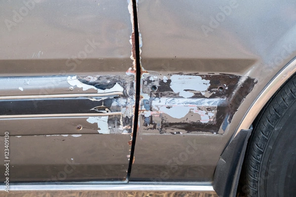 Fototapeta Car side is scratched and scraped caused the crash