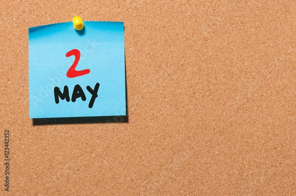 Fototapeta May 2nd. Day 2 of month, calendar on cork notice board, business background. Spring time, empty space for text