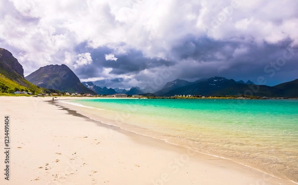 Fototapeta Rambergstranda Beach, Lofoten islands is an archipelago in the county of Nordland, Norway. Is known for a distinctive scenery with dramatic mountains and peaks.
