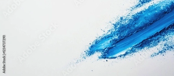 Fototapeta Blue paint splash on white background with textured application and Copy Space for text placement