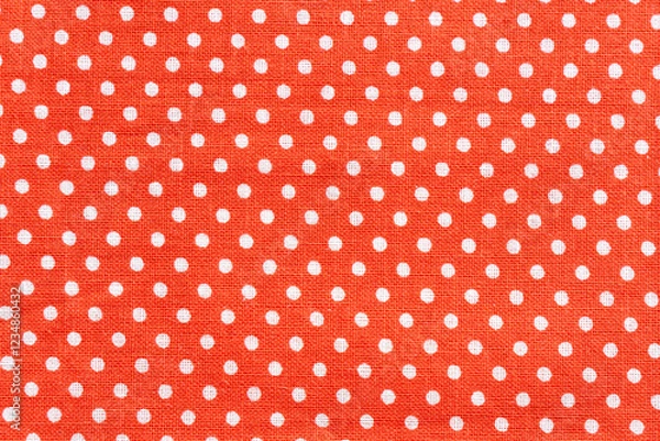 Fototapeta Red fabric background featuring white polka dots pattern