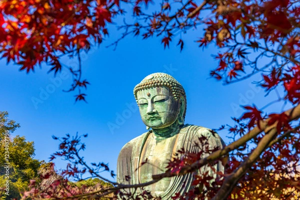 Fototapeta Ancient bronze statue of the Great Buddha Daibutsu at Kotoku-in temple in Kamakura, Japan. It is an important landmark and a popular destination for tourists.