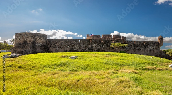 Fototapeta Exposure of the Fortaleza de San Filipe, an historic Spanish fortress used to protect the city of Puerto Plata from pirates, and is located on a hill near the seaport, Dominican Republic