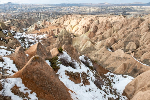 Fototapeta Rock formations of the Red Valley (Valley of Roses), Cappadocia, Turkey , in winter