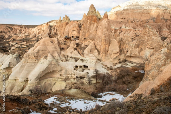 Fototapeta Rock formations of the Red Valley (Valley of Roses), Cappadocia, Turkey , in winter.