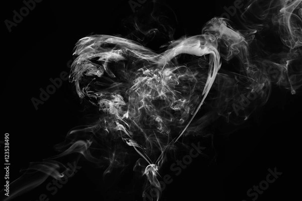 Obraz Smoke heart shape in the dark.
