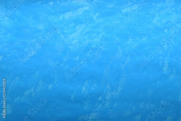 Fototapeta simple background in blue with brush strokes and scratches