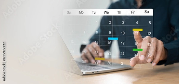 Fototapeta Businessman manages time for effective work. Calendar on the virtual screen interface, Businessman paste Post-it on important days on the calendar Important appointment dates