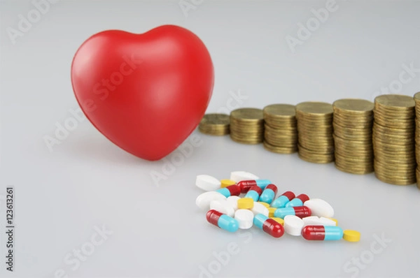 Fototapeta Stack of medicine and red heart with gold coins