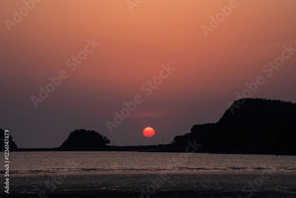 Obraz 갯벌에 지는 붉은 석양의 노을