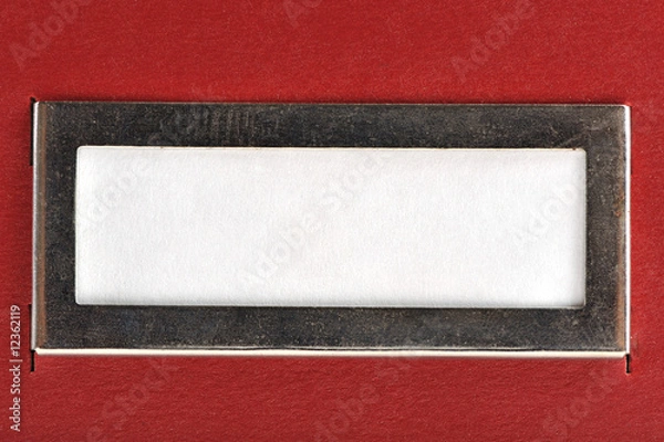 Obraz white label on an red box background
