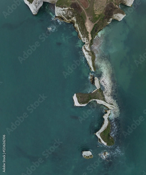 Fototapeta Beautiful aerial drone atmospheric dramatic landscape of cliffs on Jurassic Coast ni England during foggy Winter morning