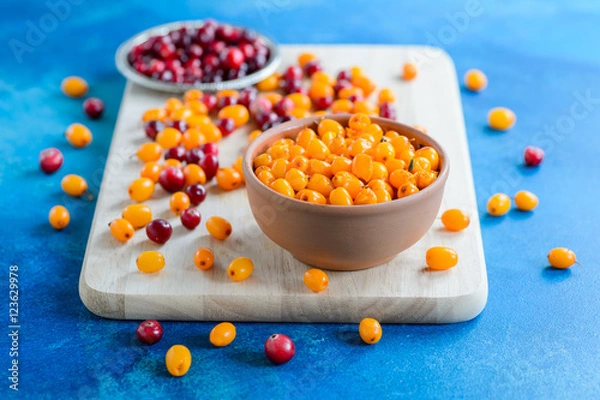 Obraz Cranberries and sea buckthorn mix